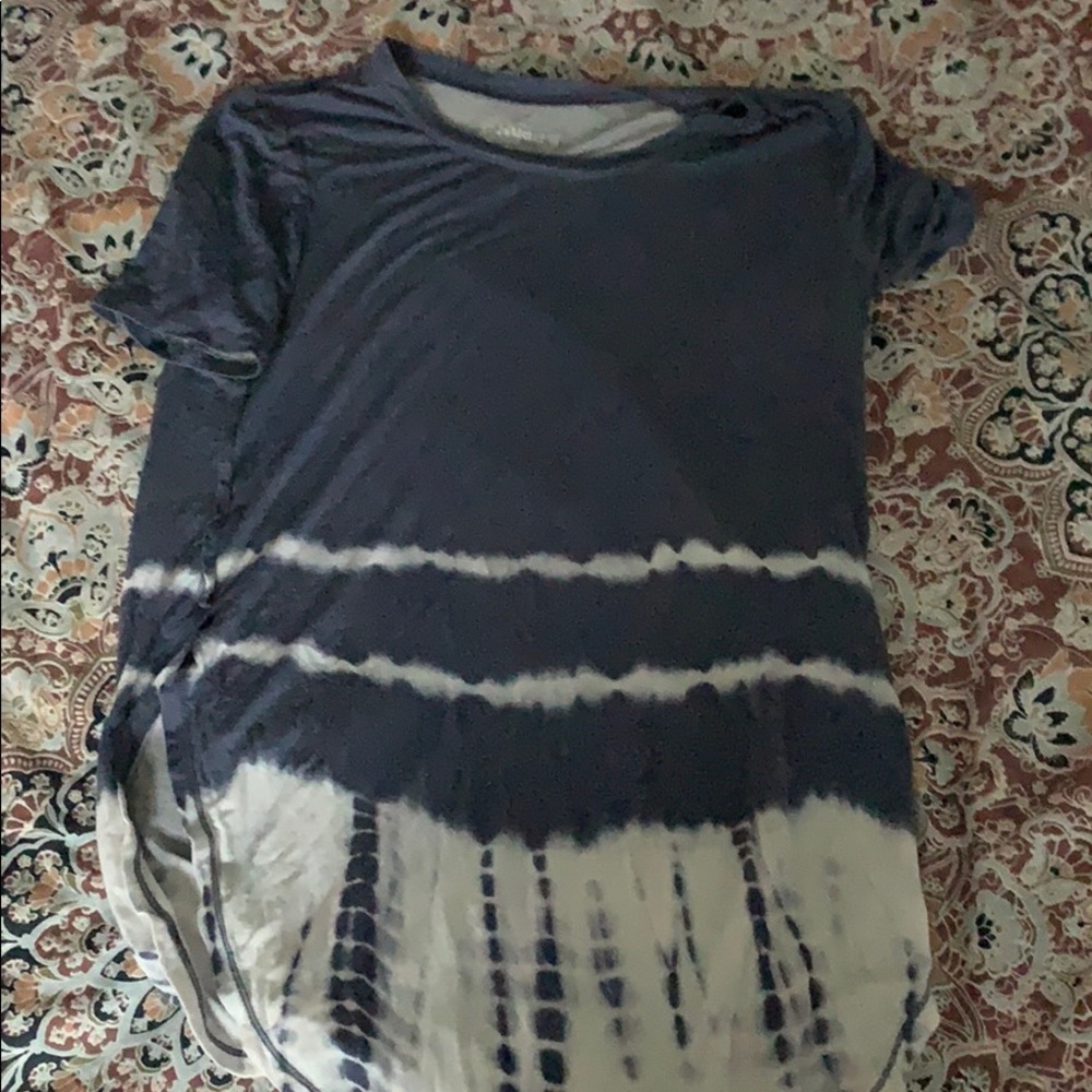 All different styles of women’s shirts.